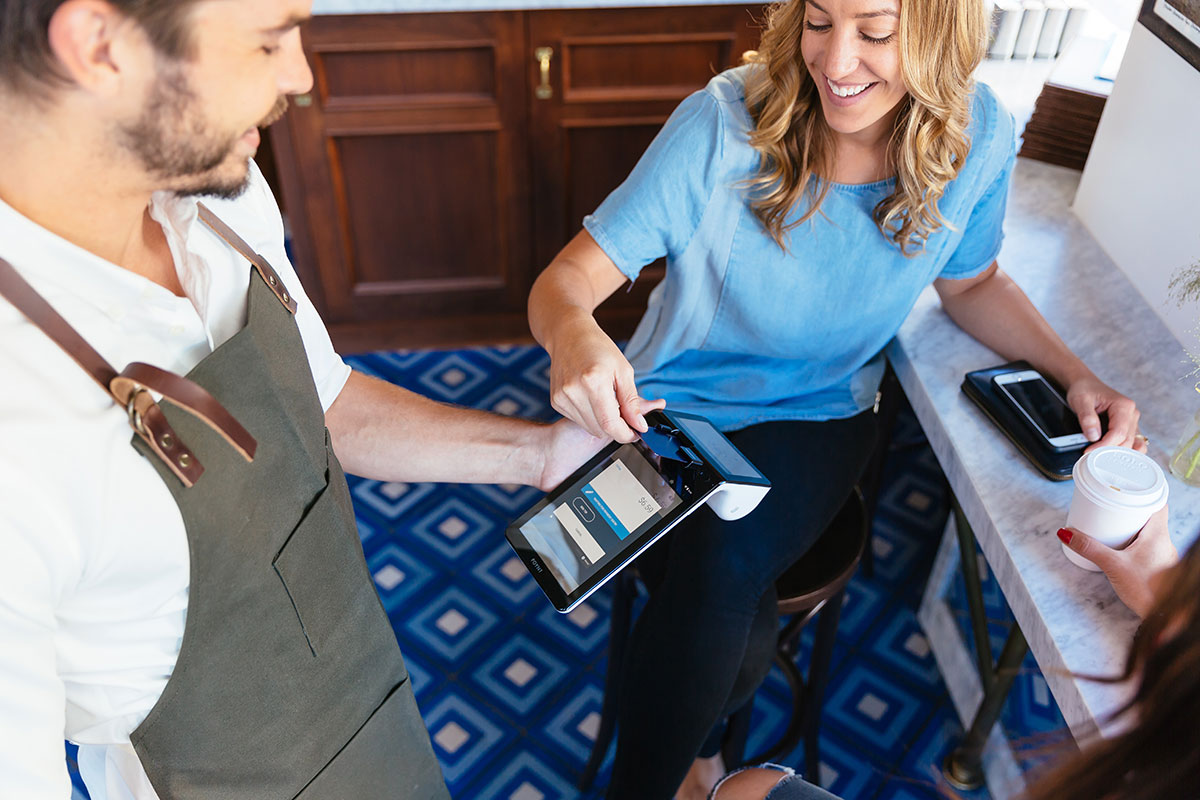 Waiter-taking-payment-with-Poynt
